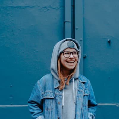 Laughing woman in a denim jacket
